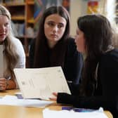 Pupils l-r Tess Worley, Abbie Hart and 
Leah Mathieson from Craigmount High School in Edinburgh look at their exam results during SQA Results Day 2023. About 140,000 pupils across Scotland are receiving exam results for their Nationals, Highers, Advanced Highers and national certificates. Picture date: Tuesday August 8, 2023. PA Photo. See PA story SCOTLAND Exams. Photo credit should read: Andrew Milligan/PA Wire