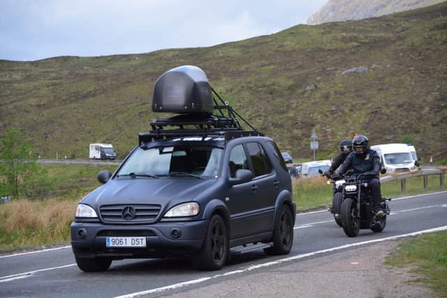 These exclusive images show film crew and stunt people filming a high speed motorbike chase through Glencoe for the upcoming Indiana Jones film. Photo: Tony Featherstone/SWNS.COM
