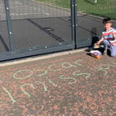 Oscar viewing a message left for him by a friend in Glasgow.