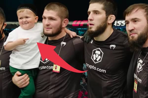 Hasbulla Magomedov and legendary pro MMA fighter Khabib Nurmagomedov celebrate in the Octagon after a UFC 267 event in the UAE in 2021.