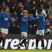 Rangers' Ross McCausland (centre) celebrates scoring their equaliser against Aris at Ibrox.