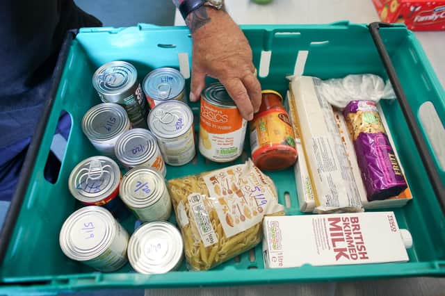 Food banks are now part of mainstream life in the UK, whether for those who use them or the people who donate (Picture: Matt Cardy/Getty Images)