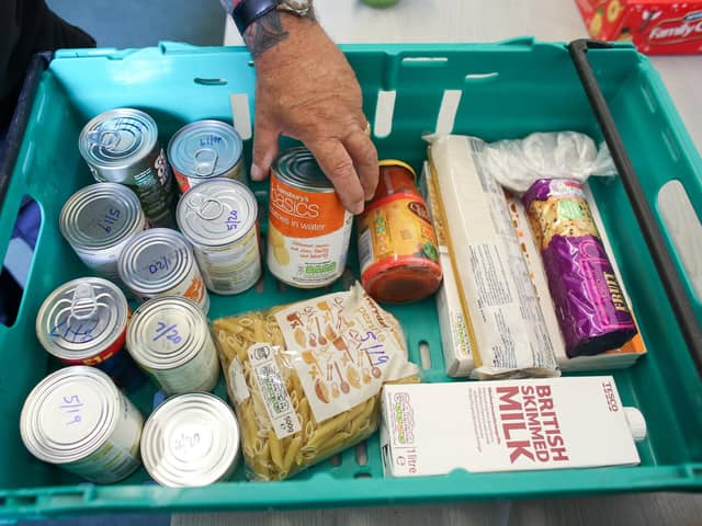 Food banks are now part of mainstream life in the UK, whether for those who use them or the people who donate (Picture: Matt Cardy/Getty Images)