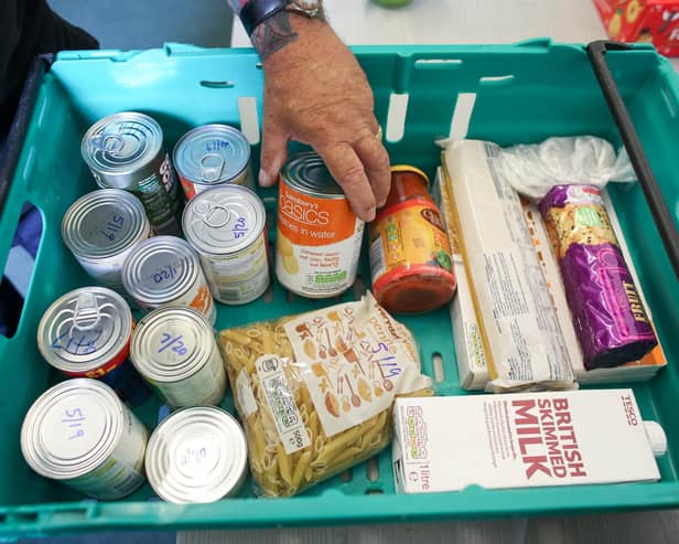 Food banks are now part of mainstream life in the UK, whether for those who use them or the people who donate (Picture: Matt Cardy/Getty Images)