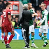 Aberdeen manager Jim Goodwin has a word with Hibs defender Ryan Porteous after his side's 3-1 defeat at Easter Road. (Photo by Paul Devlin / SNS Group)