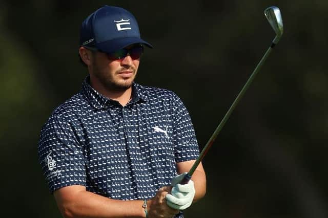 Ewen Ferguson prepares to play their third shot on the third hole during the continuation of round two of the Hero Dubai Desert Classic at Emirates Golf Club. Picture: Luke Walker/Getty Images.