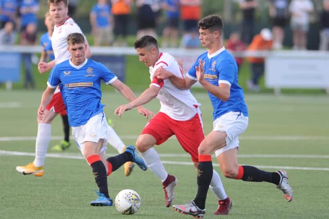 Spartans were hustled and harried by a superfit Rangers B in their Lowland League opener at Ainslie Park. Picture: Mark Brown