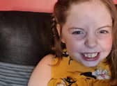 Hannah "lights up" when she hears music.