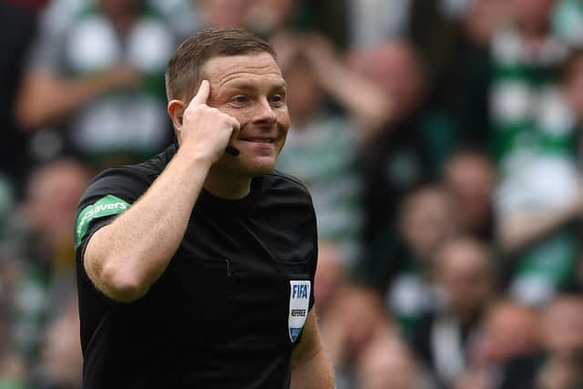 Referee John Beaton used his head to keep a firm grip on derby proceedings as Celtic Park yesterday. (Photo by Craig Foy / SNS Group)