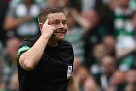 Referee John Beaton used his head to keep a firm grip on derby proceedings as Celtic Park yesterday.  (Photo by Craig Foy / SNS Group)