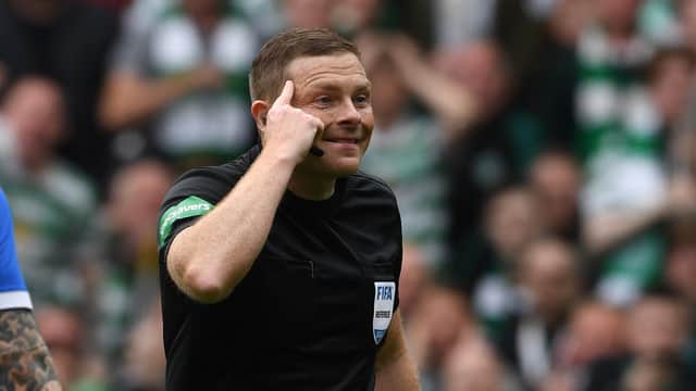 Referee John Beaton used his head to keep a firm grip on derby proceedings as Celtic Park yesterday. (Photo by Craig Foy / SNS Group)