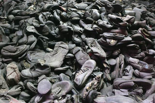 A vast pile of shoes taken from the men, women and children at the Auschwitz concentration camp in Oswiecim, Poland (Picture: Scott Barbour/Getty Images)