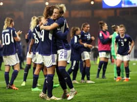 The Scotland team celebrate after the final whistle of the 2023 FIFA Women's World Cup play-off round 1 match between Scotland and Austria at Hampden Park. (Photo by Ian MacNicol/Getty Images)