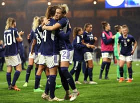 The Scotland team celebrate after the final whistle of the 2023 FIFA Women's World Cup play-off round 1 match between Scotland and Austria at Hampden Park. (Photo by Ian MacNicol/Getty Images)
