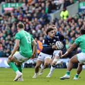 Sione Tuipulotu tries to break through the Irish defence.