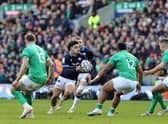 Sione Tuipulotu tries to break through the Irish defence.