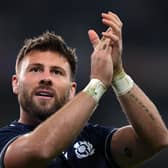 Ali Price applauds the Scotland fans after the victory over Romania. The scrum-half will start against Ireland. (Photo by Laurence Griffiths/Getty Images)