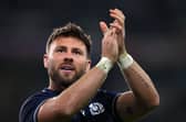 Ali Price applauds the Scotland fans after the victory over Romania. The scrum-half will start against Ireland. (Photo by Laurence Griffiths/Getty Images)