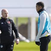 Hearts interim manager Steven Naismith gives defender Toby Sibbick some advice during training.
