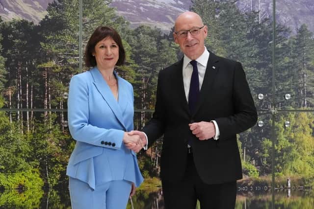 Chancellor Rachel Reeves with First Minister John Swinney on a visit to Glasgow (Picture: Andrew Milligan - Pool/Getty Images)