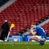 An emotional Liam Craig speaks to his family on his mobile phone following St Johnstone's Betfred Cup win over Livingston  (Photo by Craig Williamson / SNS Group)