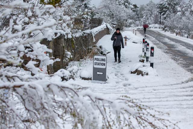 Snowy conditions at a Scottish Parliamentary election polling station in the village of Farr, near Inverness. (Picture credit: Paul Campbell/PA Wire)