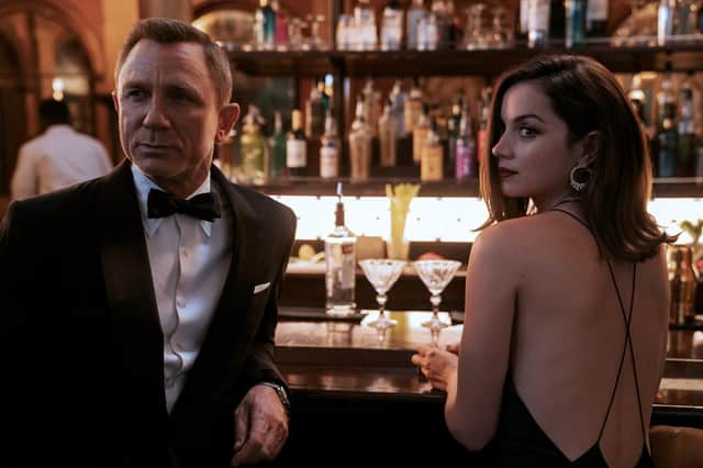 Daniel Craig playing James Bond and Ana de Armas as Paloma in the new Bond film No Time To Die.