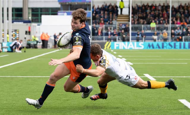 Chris Dean attempts to elude the tackle of Wasps' Jimmy Gopperth during Edinburgh's recent Challenge Cup quarter-final. (Photo by Ross Parker / SNS Group)