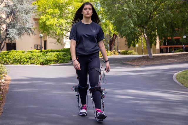 Student Ava Lakmazaheri tests an exoskeleton boot that can increase walking speed and reduce the effort required (Picture: Kurt Hickman/Stanford University/PA Wire)
