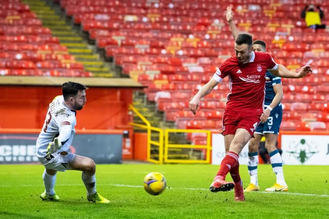 Andy Considine puts Aberdeen 2-0 up against ten-man Motherwell.