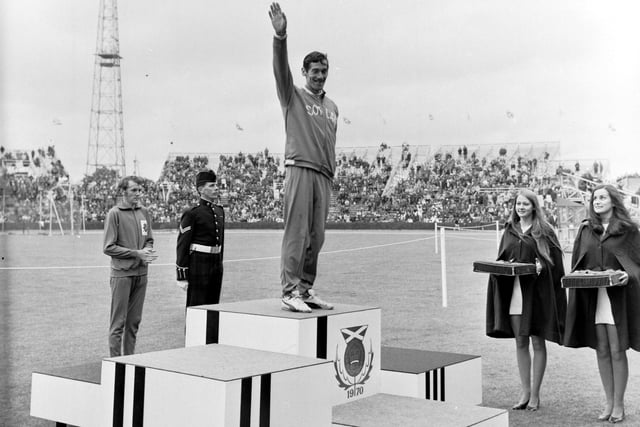 Scottish athlete Lachie Stewart mounts the podium to collect his gold medal, won in the Commonwealth Games 10,000 metres final at Meadowbank Stadium in July 1970.