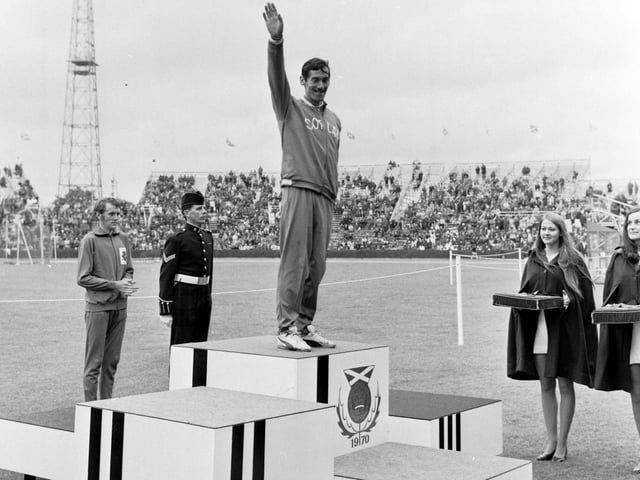 Scottish athlete Lachie Stewart mounts the podium to collect his gold medal, won in the Commonwealth Games 10,000 metres final at Meadowbank Stadium in July 1970.