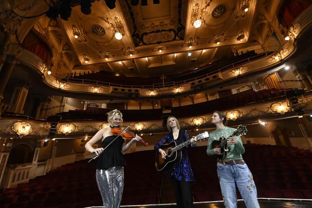 Aileen Reid, Jenn Butterworth and Laura Beth Salter of Scottish folk powerhouse Kinnaris Quintet launch the programme for the 2024 Celtic Connections festival in Glasgow at the Pavilion Theatre. Picture: Rob Casey/SNS Group