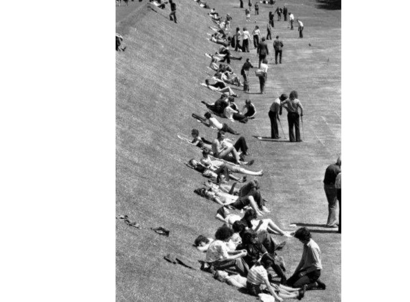Crowds enjoying the sunshine at the former putting green in East Princes Street Gardens, in Edinburgh, in 1976.