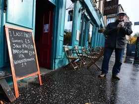 A pub sign in Glasgow put up during the Covid pandemic. Picture: John Devlin