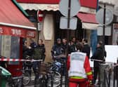 French police secure the street after several shots were fired along rue d'Enghien in the 10th arrondissement, in Paris on December 23, 2022. - Two people were killed and several injured in a shooting in central Paris on December 23, 2022, police and prosecutors said, adding that the shooter, in his 60s, had been arrested. (Photo by Thomas SAMSON / AFP) (Photo by THOMAS SAMSON/AFP via Getty Images)