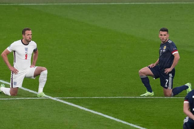 Players take the knee against racism before the UEFA EURO 2020 Group D football match between England and Scotland at Wembley Stadium (Getty Images)