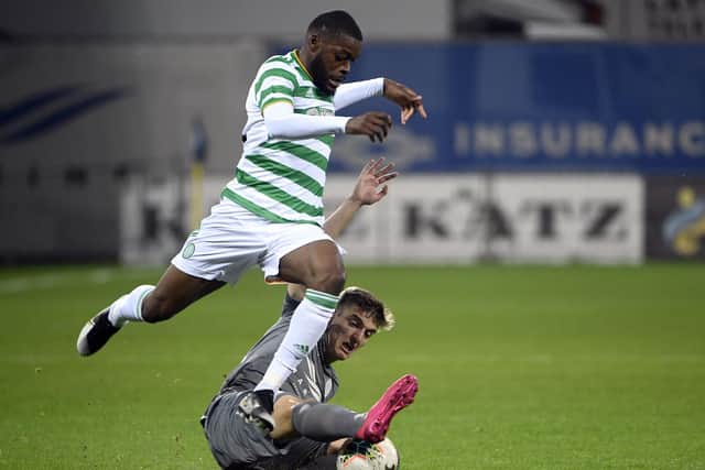 Celtic's Olivier Ntcham is challenged by Riga's Marko Djurisic during Celtic's Europa League third qualifying round win in the Skonto stadium. (AP Photo/Roman Koksarov)