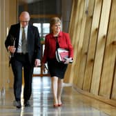 John Swinney, seen with Nicola Sturgeon, has insisted there was 'absolutely no political interference' in the Scottish Covid inquiry (Picture: Andy Buchanan/AFP via Getty Images)
