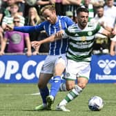 Kilmarnock midfielder makes no bones about the fact he isn't unhappy injury will force: former team-mate in Celtic's Greg Taylor to miss the clubs' Viaplay League Cup semi-final. (Photo by Rob Casey / SNS Group)