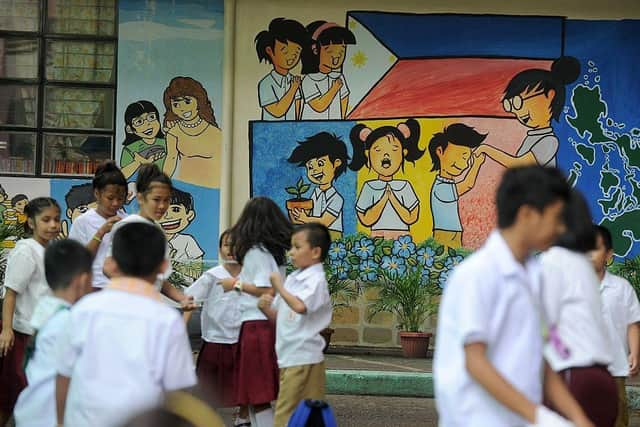 Filipino children often work long hours to complete homework tasks.