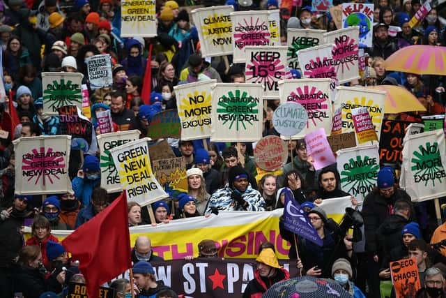 Climate protestors march in Glasgow during the United Nations' COP26 climate summit in November (Picture: Jeff J Mitchell/Getty Images)