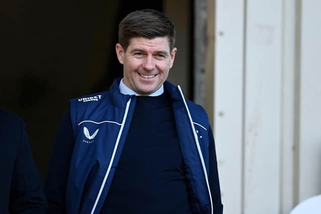 Steven Gerrard has plenty to smile about as Rangers top the Premiership table and can look forward to Europa League group stage football (Photo by Rob Casey / SNS Group)