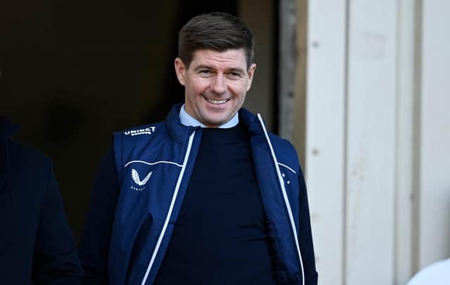 Steven Gerrard has plenty to smile about as Rangers top the Premiership table and can look forward to Europa League group stage football (Photo by Rob Casey / SNS Group)