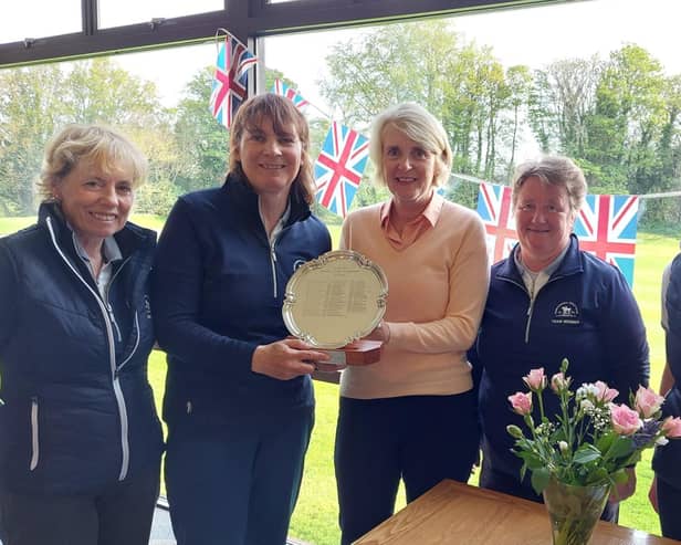 Mortonhall's winning team in the Edinburgh Ladies Inter Club tournament received the trophy from host club Liberton's lady captain Sue Hay.