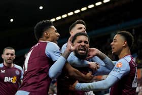 Aston Villa's Douglas Luiz (centre) celebrates after scoring his side's winner against Burnley.