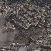 This image provided by Maxar Technologies shows an overview of al-Ahli Hospital after explosion in Gaza City.  (Satellite image ©2023 Maxar Technologies via AP)