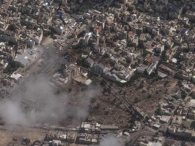 This image provided by Maxar Technologies shows an overview of al-Ahli Hospital after explosion in Gaza City.  (Satellite image ©2023 Maxar Technologies via AP)
