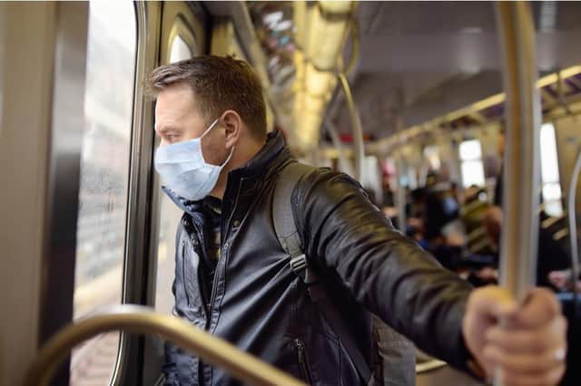 Face coverings must be worn on public transport and certain indoor settings