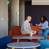 Student in discussion with lecturer at QMU's Learning Resource Centre